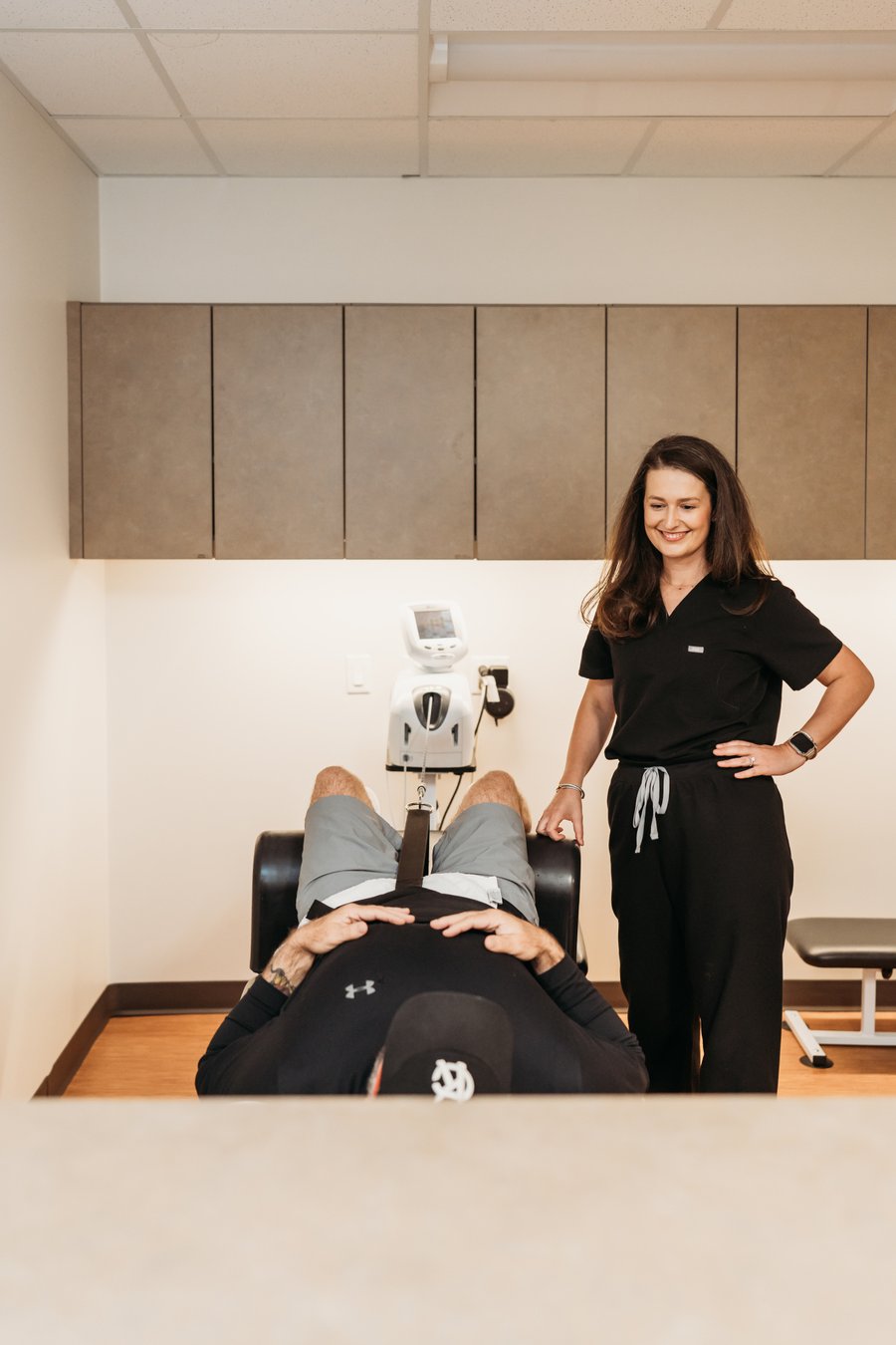 Dr. Lauren with patient receiving spinal decompression therapy